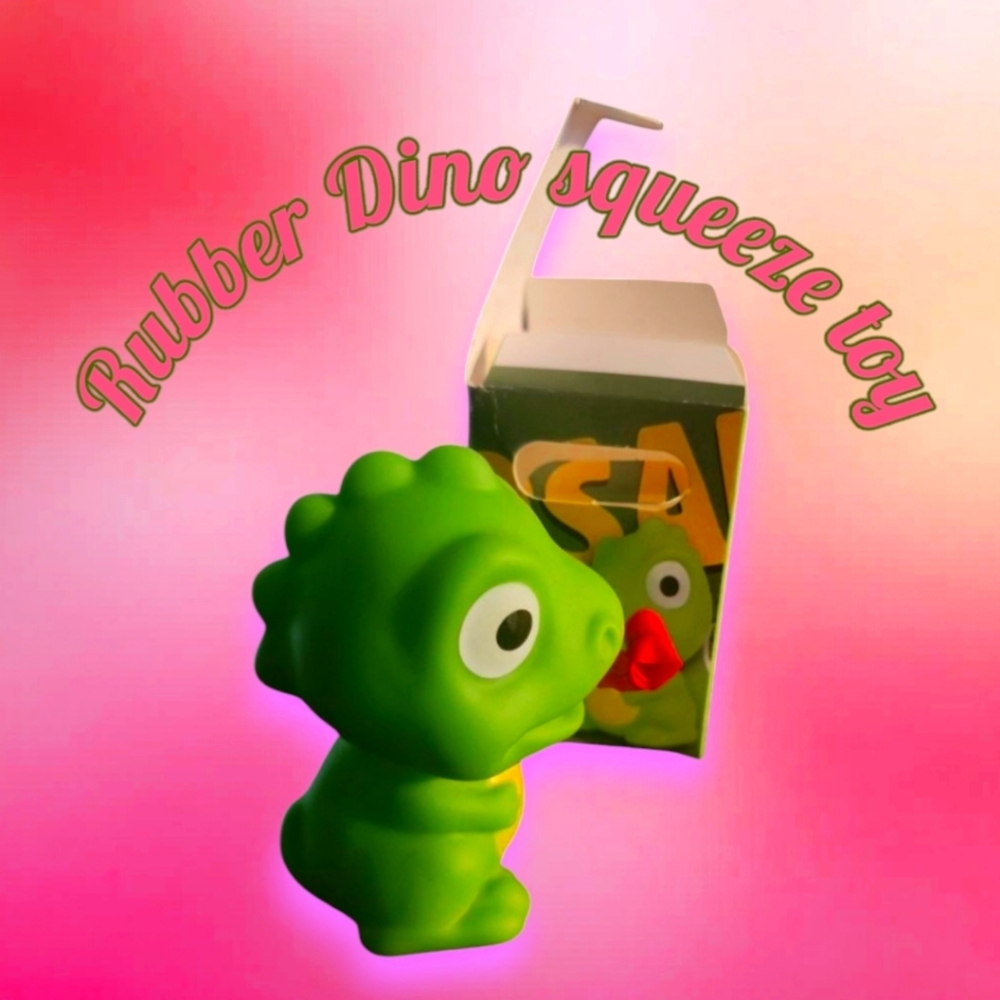 Green dinosaur squeek toy with extending tongue